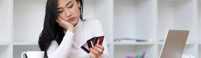 Woman Discharging Credit Card Debts In Kaneohe